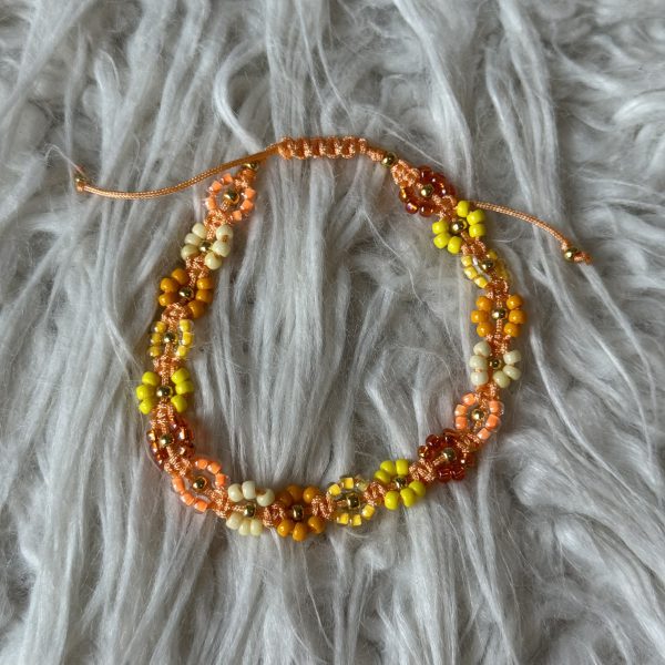 Flower "geel/oranje" met goudkleurige kern
